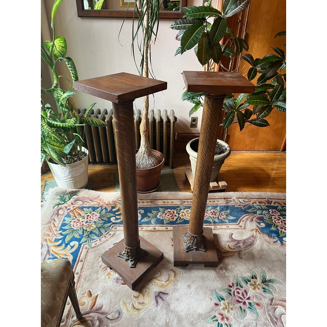 Antique pair of column pedestals dating to the late Victorian–Edwardian period, likely produced in the United States or...
