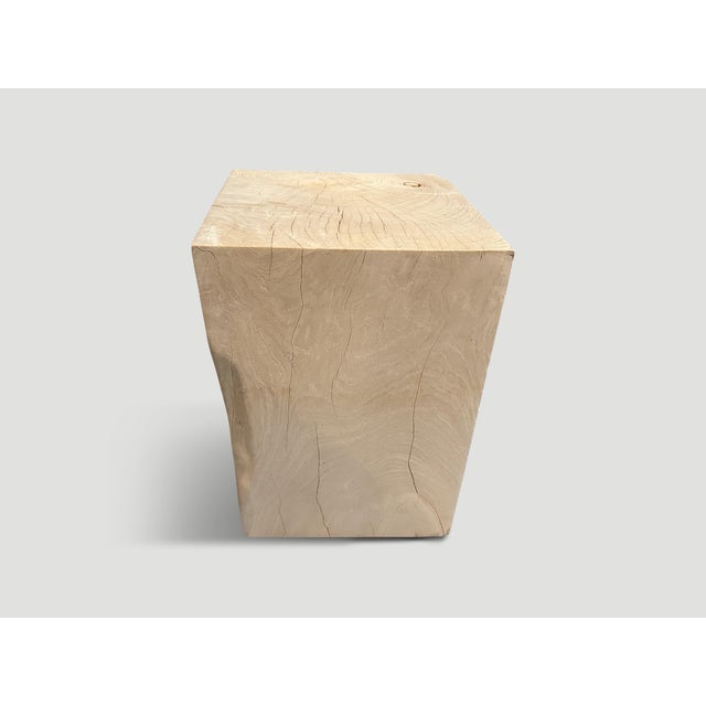 Reclaimed teak wood side table, hand carved whilst respecting the natural organic wood. Bleached to a bone finish. The St....