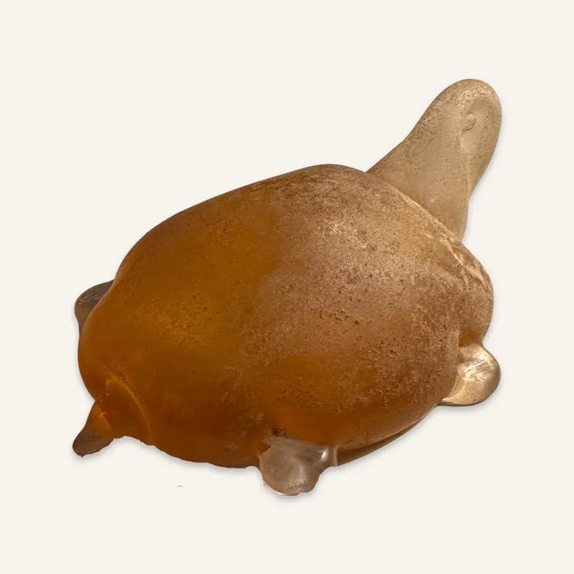 This little Murano turtle is in varying shades of amber. He appears to be made from pate de verre, which is a French...