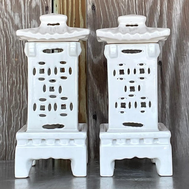 Illuminate your space with our Vintage Asian Glazed Ceramic Pagoda Lanterns - A Pair. These exquisite pieces blend Asian...