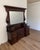 Vintage Heywood-Wakefield dresser with an impressive architectural mirror and warm dark wood finish. The substantial two-...