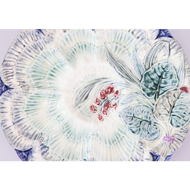 A lovely antique Belgian Wasmuel majolica oyster plate decorated with a Lily of the Valley floral spray, circa 1880....