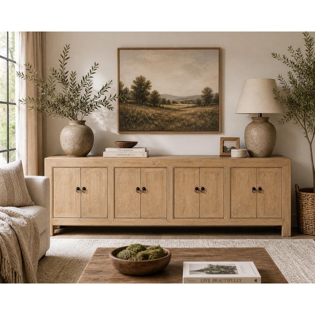 Handcrafted from solid weathered wood, the Eight-Door Sideboard brings timeless organic elegance and expansive storage...