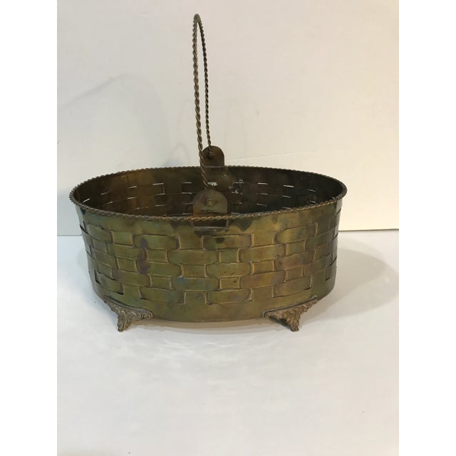 This is a darling letter holder, wonderfully woven brass basket with handle. It was sold by my friend’s father in the 1960...