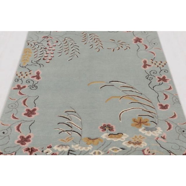 Hand-knotted in wool, this 4x6 rug by Rug & Kilim is directly inspired by the rich history of antique Chinese Art Deco...