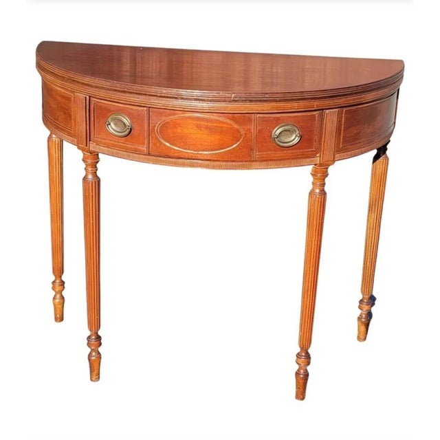 A exquisite 19th Century American Federal Hepplewhite Mahogany Demi-Lune Flip-Top Console table or Card Table in very good...