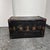Design Plus Gallery presents a Vintage Steamer Trunk from Hartmann. The rectangular case is wrapped in black material and...