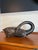 A sculptural hand-carved durastone swan by Austin Productions, dating to the 1970s. Executed with an elegantly curved...