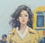 Original oil portrait by Sean Wu, The girl in the trench coat at the bus station.