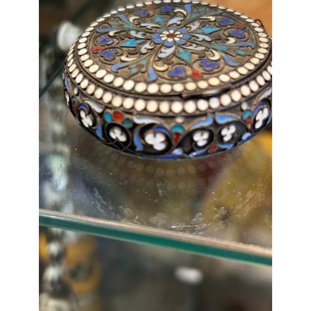 Gem of a Russian antique cloissone pill box having intricate details and Marked 84. 875/1000 silver inside. Details...