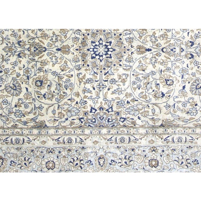 The Semi Antique Persian Kerman Rug is an exquisite piece of artwork, handcrafted in the Kerman region of Iran. With its...