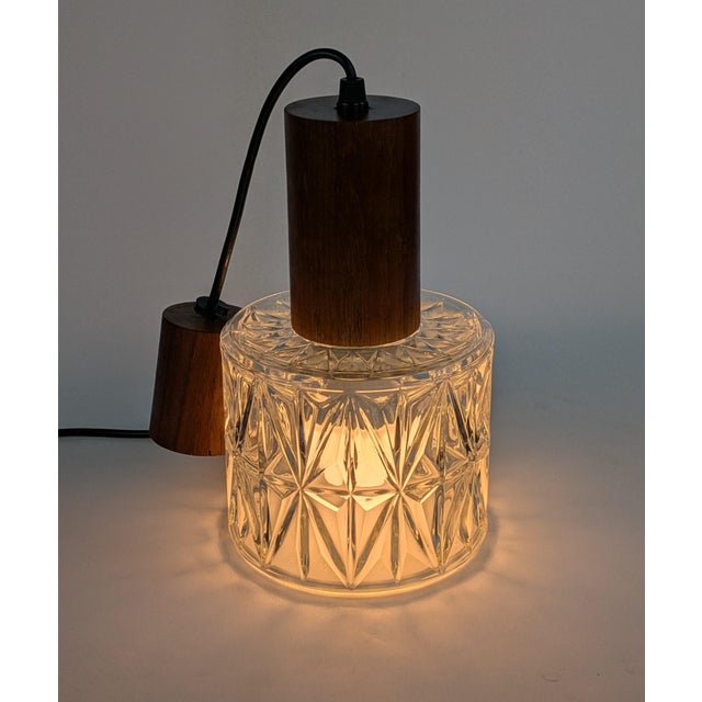 Dimensions: ø14 x d25 total height: 50 cm standard e27 metal socket small teak and molded glass lantern. the buyer can...