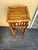 This vintage burnt tortoise bamboo Side table. This versatile furniture piece is suitable for showcasing plants or acting...