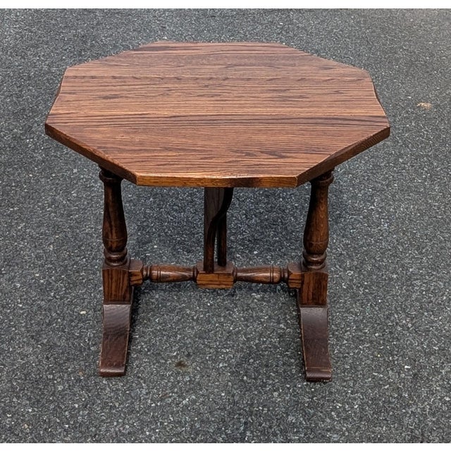 A charming and practical piece of vintage furniture! This 1940s Oak Drop Leaf Table is the perfect nightstand or accent...