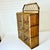 Chippendale criss cross design is classic and always in style. This wall-mounted 3-shelf wicker cabinet is lovely with a...