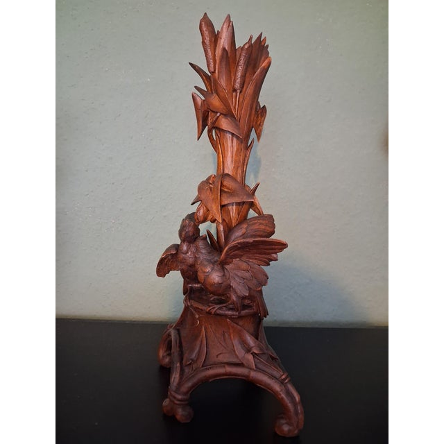This vase holder with wonderful floreal design and two Birds sculpture is made on Brienz Region ,Swiss. A lot of...
