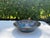 A beautifully crafted vintage studio pottery bowl featuring a rich blue glaze with striking tonal variation throughout....