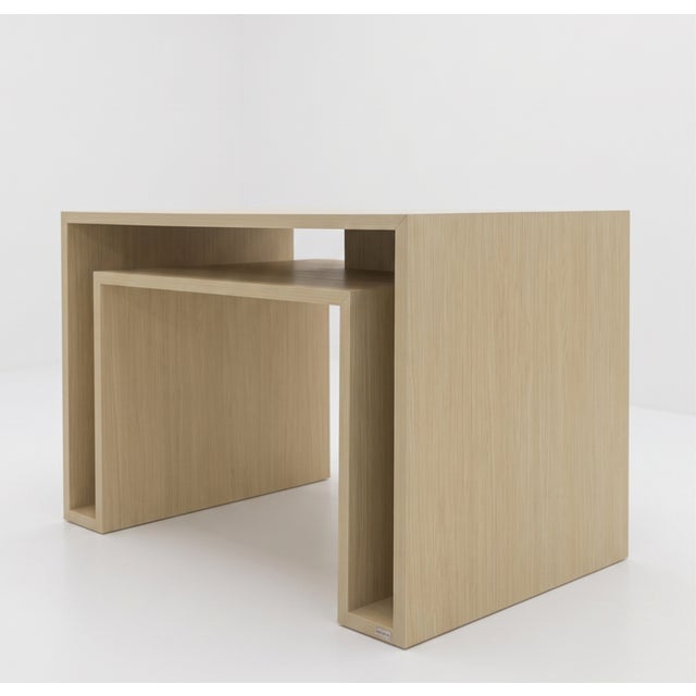 The shape table, designed by dario nasuti, is a monumental evolution of the double inverted "c" geometry, a hallmark of...