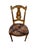 This French antique gold gilded Louis XIV wooden chair, circa late 1800s or early 1900s is inspired by the opulence and...