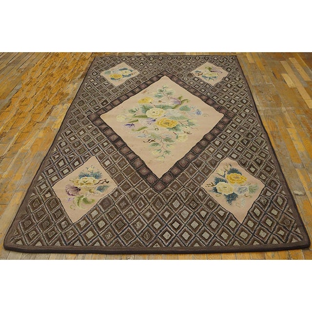 Antique American Hooked rug. Measures: 4'2" x 8'7".