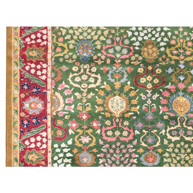 A rare and wonderful early 20th century German Tetex rug with a traditional Tabriz pattern containing myriad trees-of-life...