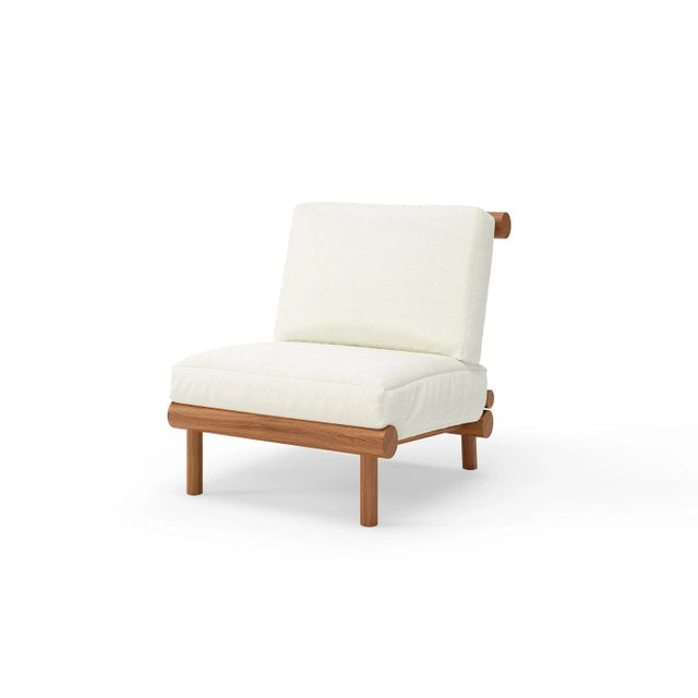 The Rishon Lounge Chair – Classic Cushion Edition offers a softer take on modern luxury, pairing our sculptural teak frame...