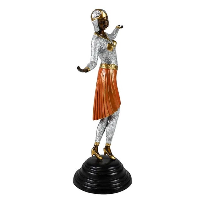 Art Deco Style Bronze Dancing Lady Sculpture.Measures 20.5 inches x 8 inches diameter.