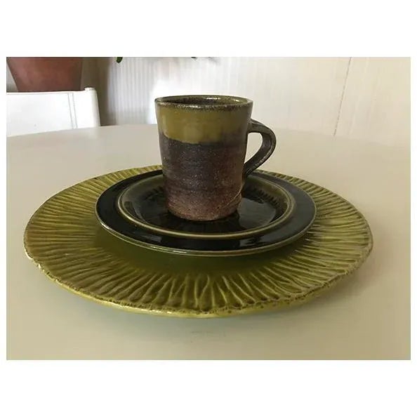 A stunning Artisan Made Stoneware Mug. Has beautiful primitive, handcrafted details like the handle as well as the rings...