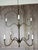 Presenting a breathtaking new sculptural chandelier exclusively by Miamar Home, a masterwork where old-world blacksmith...