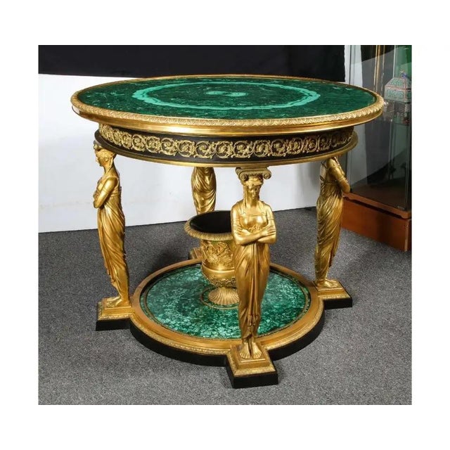An impressive empire style malachite and ormolu center table after the imperial model by Francois Honore Georges Jacob-...