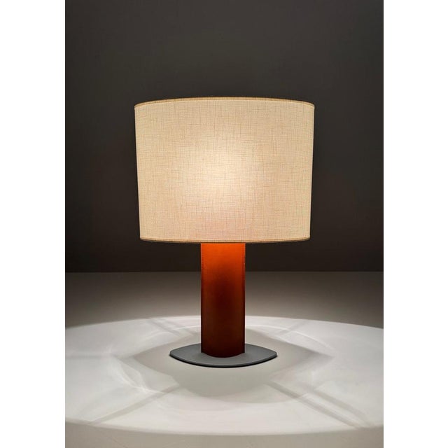 Taller Uno Serena Table Lamp with Leather-Clad Shaft, 1990s, in Very Good conditions. Designed 1990 to 1999 This piece has...