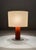 Taller Uno Serena Table Lamp with Leather-Clad Shaft, 1990s, in Very Good conditions. Designed 1990 to 1999 This piece has...