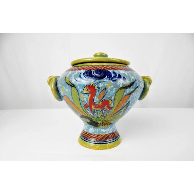 Charming Mid-Century Modern Italian ceramic vessel with lid featuring a stylized painted deer. Wonderful painted glazed...
