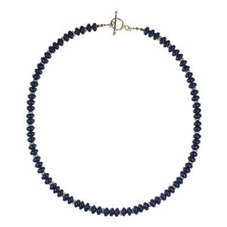 Ajd 19.5 Inch Black Jet 8 MM Rondel Necklace With Goldy Daisy Accents For Sale