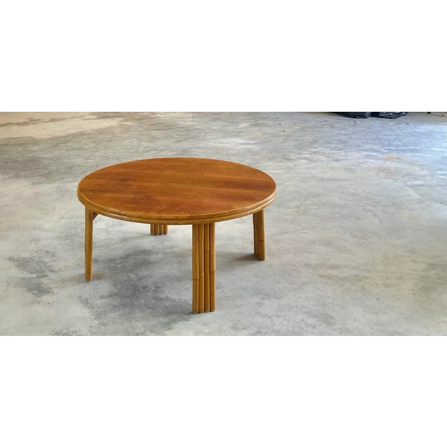 Pole round rattan coffee table with a nice clean walnut veneer surface. We have a glass top that is not included in the...