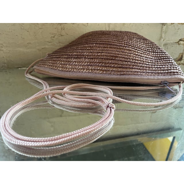 Vintage 1980s Lavender woven crossbody bag made in Italy. Lightweight with a simple yet elegant retro design and long...