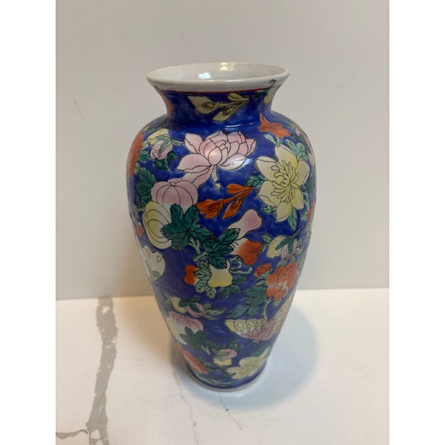 I love the colors in this beautiful vase most likely produced in the mid 20th century. The style features a vibrant cobalt...