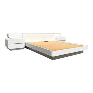 Postmodern White Gloss Laminate King Size Platform Bed With Storage Headboard and Waterfall Nighstands - 4 Pieces For Sale