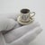 A vintage silver miniature set composed of an espresso cup with matching saucer, handcrafted in silver in Italy between...