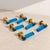 A set of six Italian door handles from the 1970s, crafted from deep blue Murano glass with brass mounts and details. Each...
