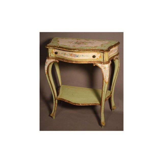 When I found this petite French console, I was attracted to the fanciful hand painted and decorated surface with floral...