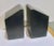 Great pair of cut black granite blocks in tall block modern form. The matte or honed finish on the top and three sides...