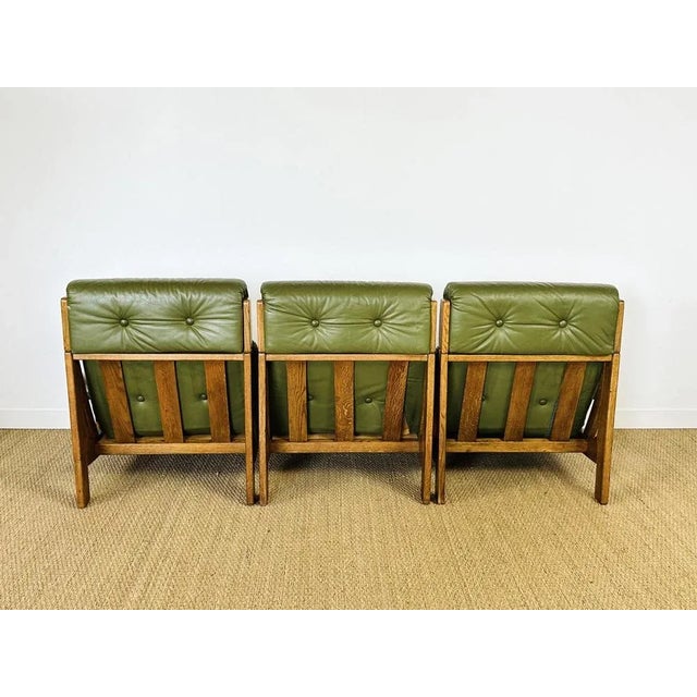 Modular scandinavian living room in teak and green leather dating from the sixties. composed of three modules. adjustable...