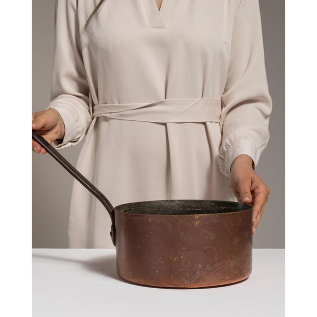 This 19th century serving piece from Belgium is finished in terra cotta, worked in copper. Its form follows honest, well-...