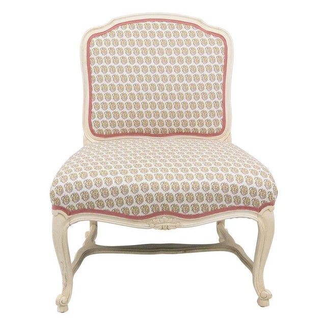 Pair of Louis XV style painted slipper chairs on cabriole legs. Newly upholstered in Casa Branca Jodhpur fabric in Salmon...