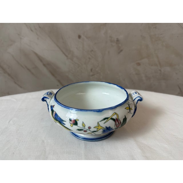 Charming antique Gien earthenware dinner service, Rouen pattern, also known as the "Cornucopia" design. This lovely...