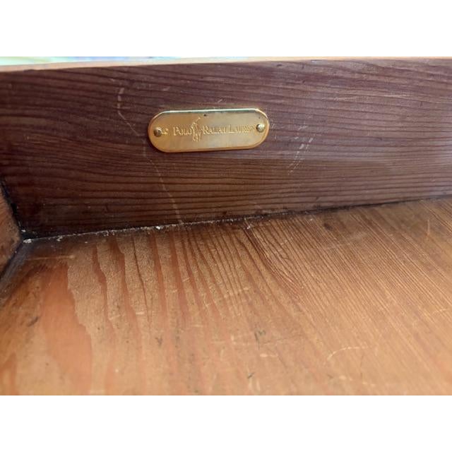 This Rare Ralph Lauren American Mahogany Dropleaf Table is a fully assembled antique piece featuring a hidden retractable...