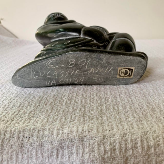 Inuit Soapstone Carving by Lucassie Amm – Signed - Kneeling Inuk Figure For Sale - Image 13 of 18
