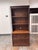 Design Plus Gallery presents the Livingston Bookcase from Pottery Barn. This two-piece wooden unit showcases a traditional...