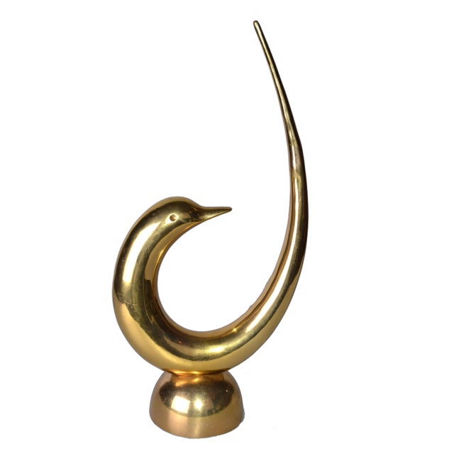 Tall mid-century modern bronze dolphin table sculpture. No maker's mark. It has developed a patina. A-584-344